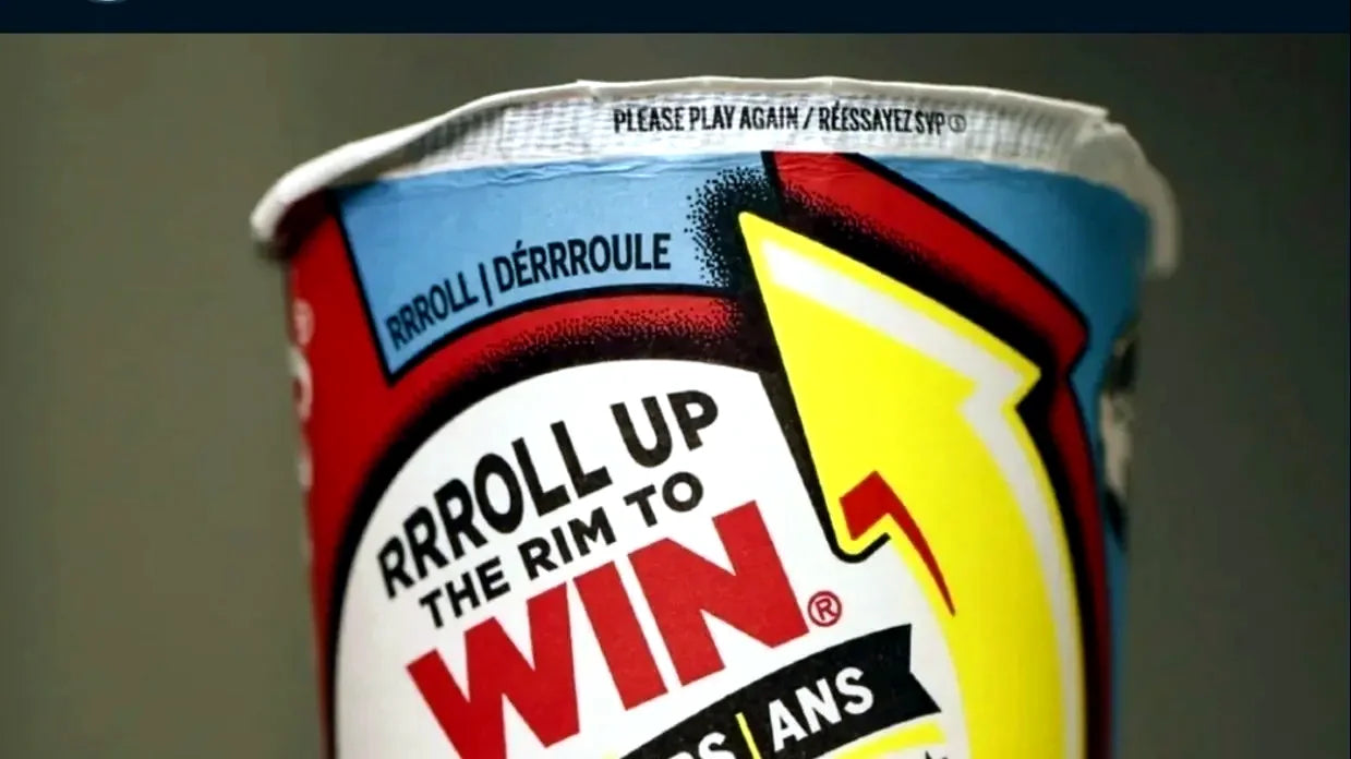 Old Roll Up the Rim to Win cup with the rim rolled open